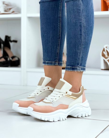 Beige sneakers with pink inserts and notched sole