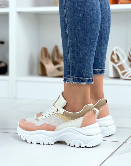 Beige sneakers with pink inserts and notched sole