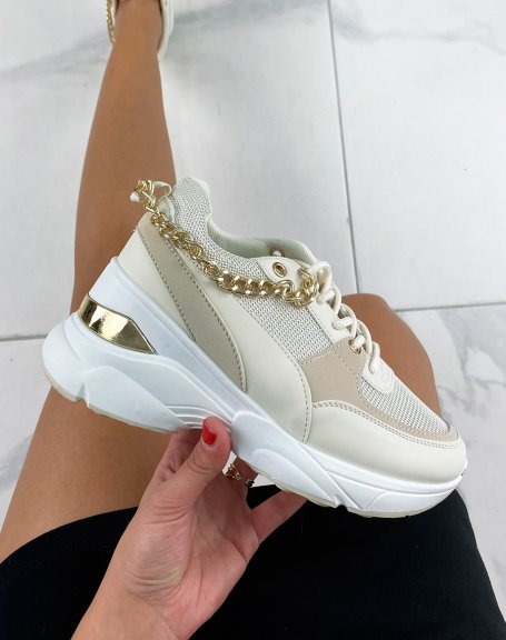 Beige sneakers with white sole and gold chain