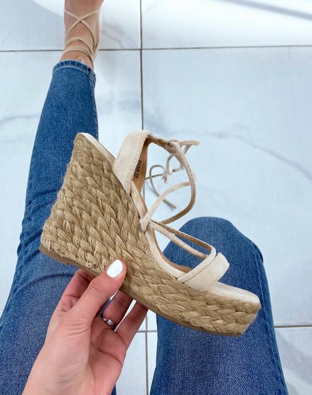 Beige suede lace-up wedges