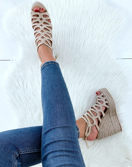 Beige suede wedges open with laces behind the ankle