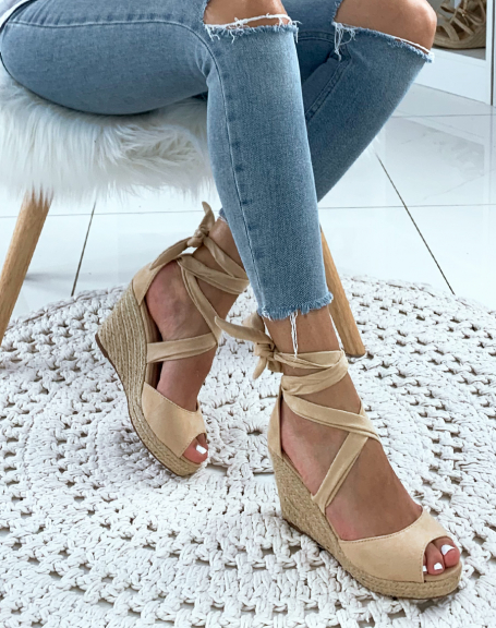 Beige suede wedges with crisscrossed laces