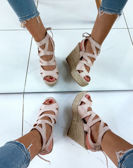 Beige suede wedges with multiple straps and laces