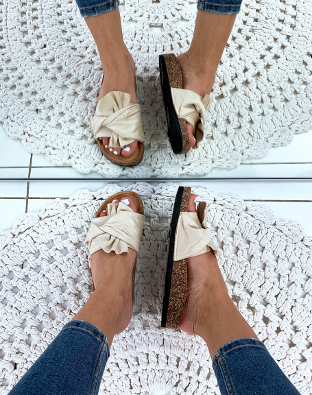 Beige suedette mules with large flying bow