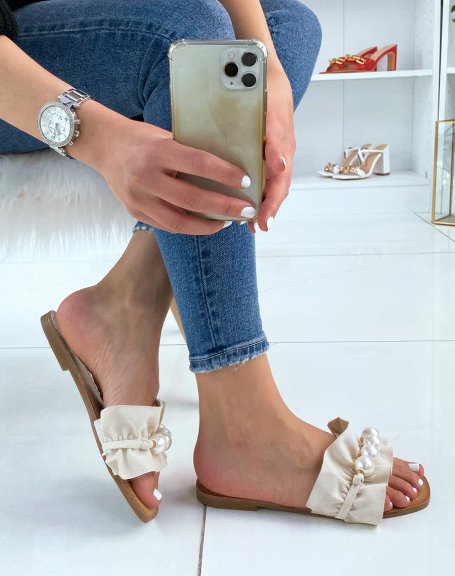 Beige suedette mules with large pearls
