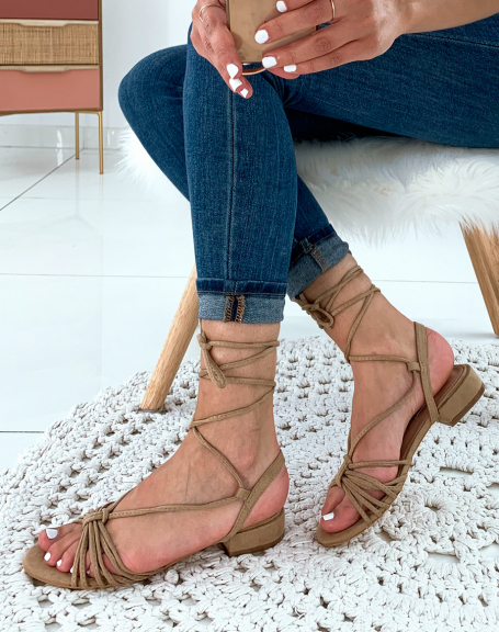 Beige suedette sandals with low heels and laces