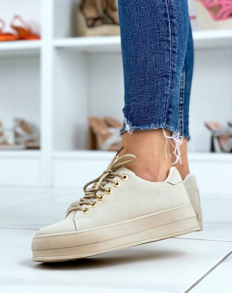 Beige suedette sneakers with beige sole and golden eyelets