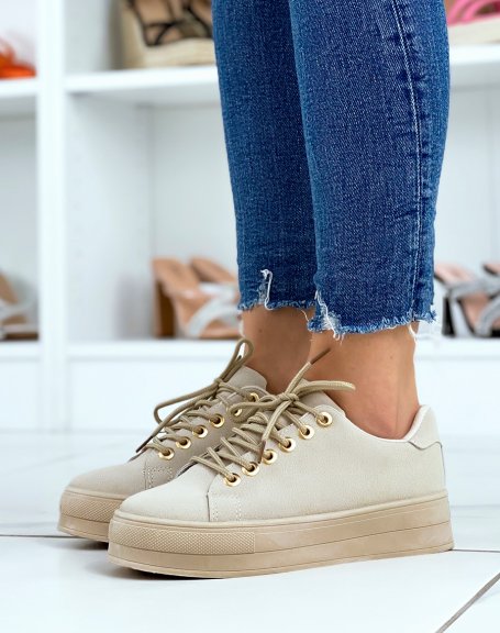 Beige suedette sneakers with beige sole and golden eyelets