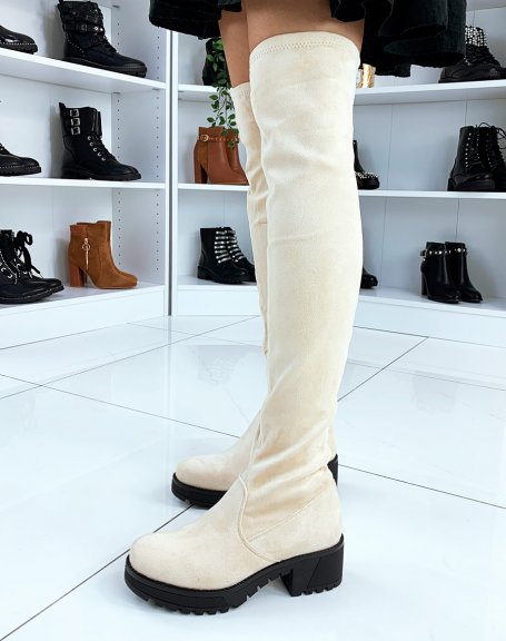 Beige thigh-high boots with black notched heel