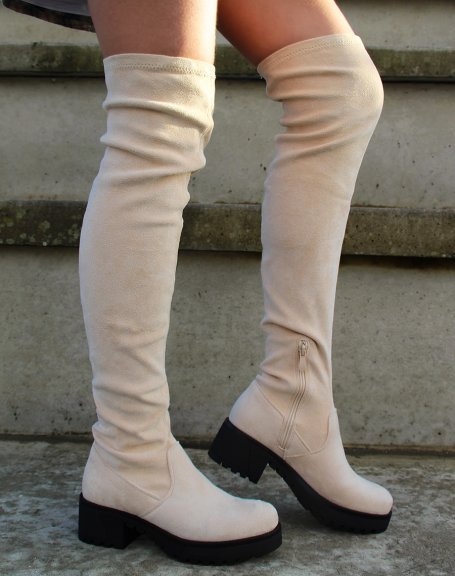 Beige thigh-high boots with black notched heel