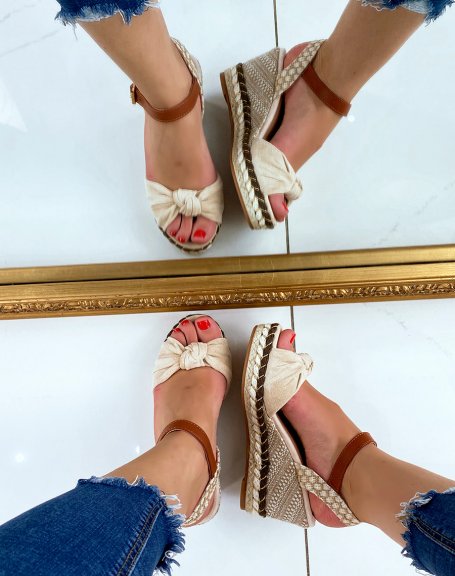 Beige wedge sandals with bow strap