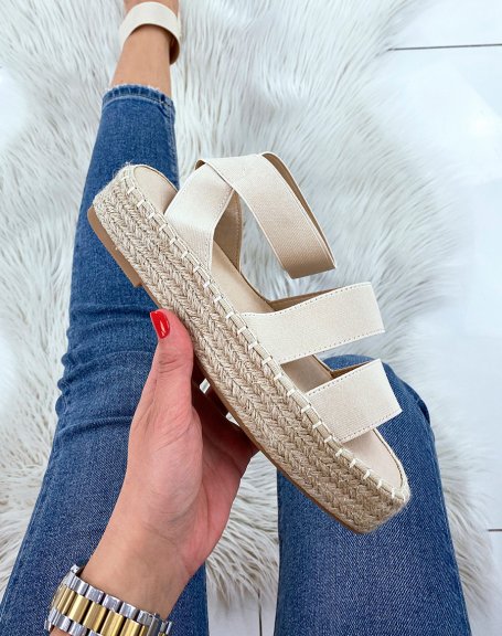 Beige wedge sandals with elastic straps