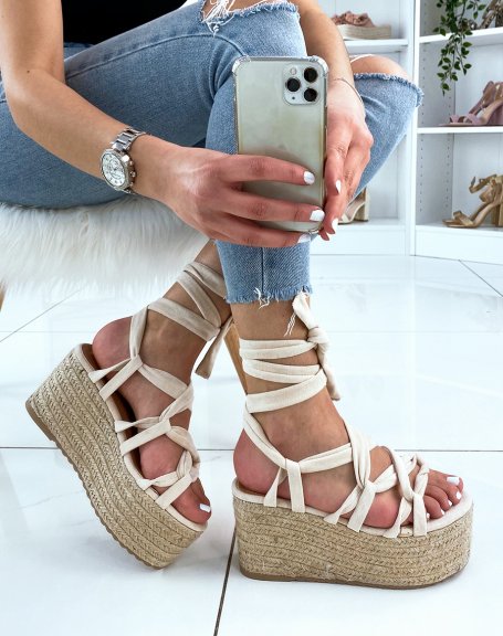 Beige wedge with crisscross strap