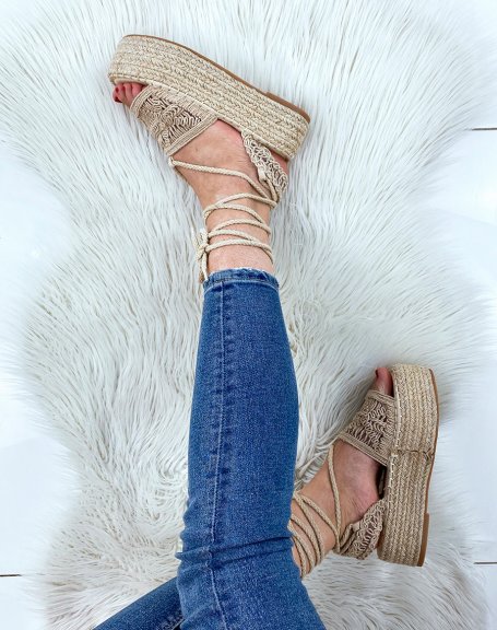 Beige wedges with embroidered details