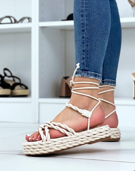 Beige wedges with long straps and braided sole