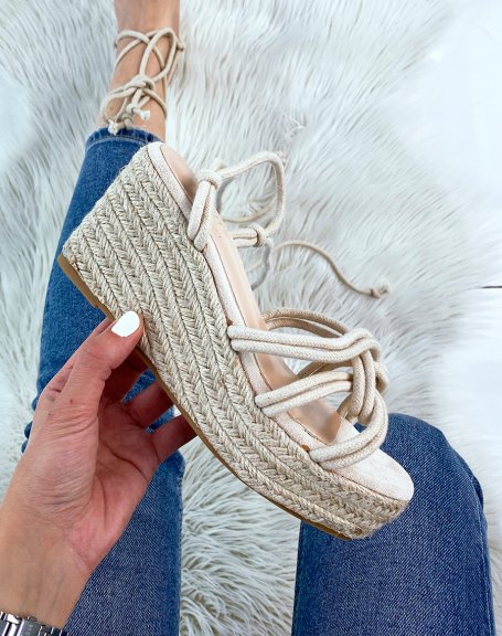 Beige wedges with long straps and jute sole