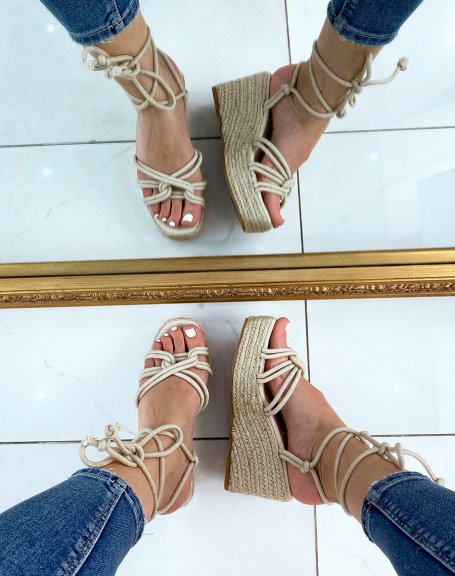 Beige wedges with long straps and jute sole