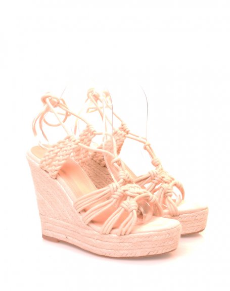 Beige wedges with multiple intersecting straps
