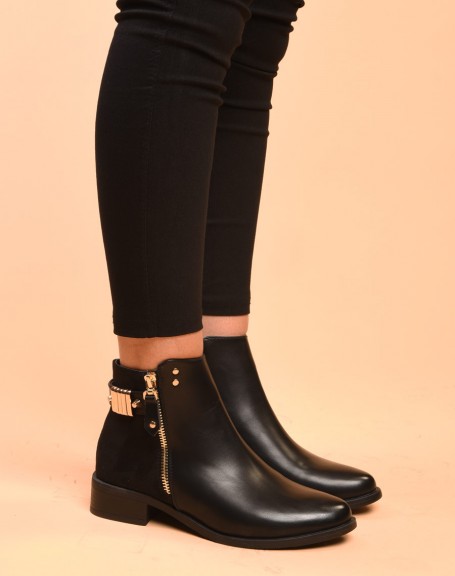 Bi-material flat black ankle boots with details at the back
