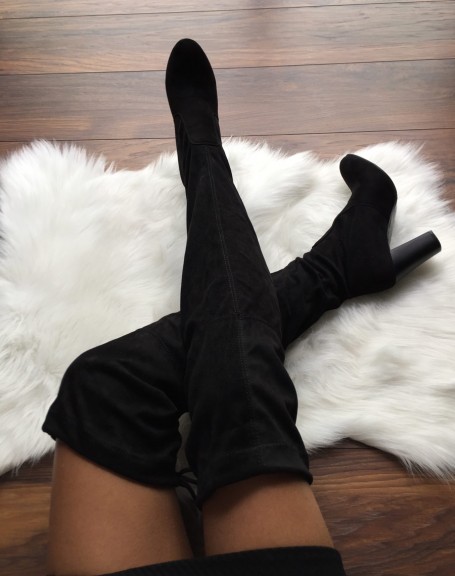 Black adjustable thigh-high boots with heels