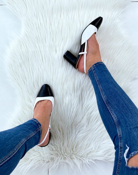 Black and white pumps with round toe and low heel