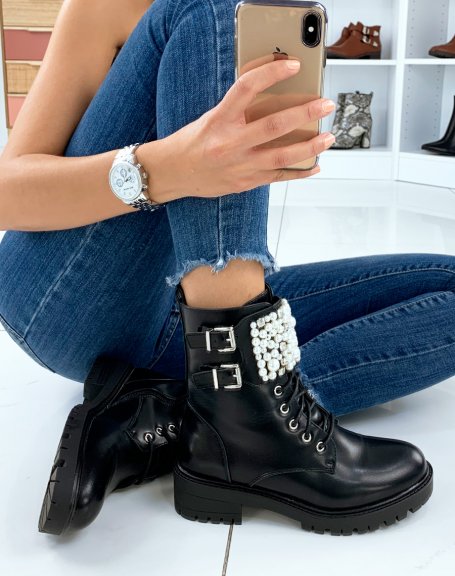 Black ankle boots adorned with multiple pearls