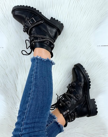 Black ankle boots adorned with multiple straps