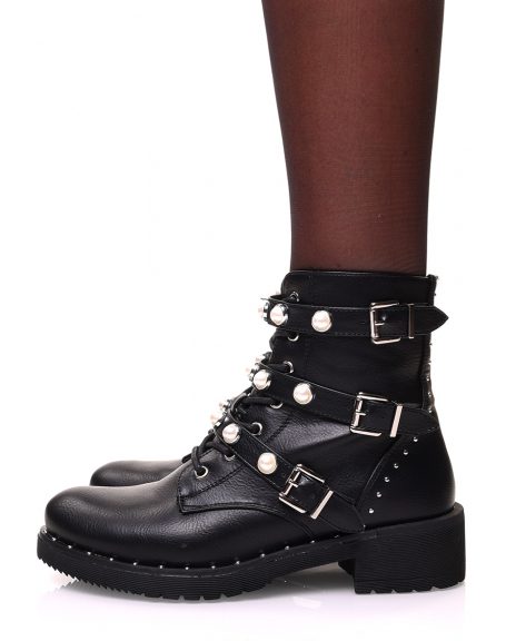 Black ankle boots beaded with studs and beaded straps