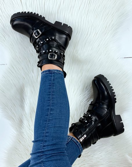 Black ankle boots strapped and studded with rhinestones