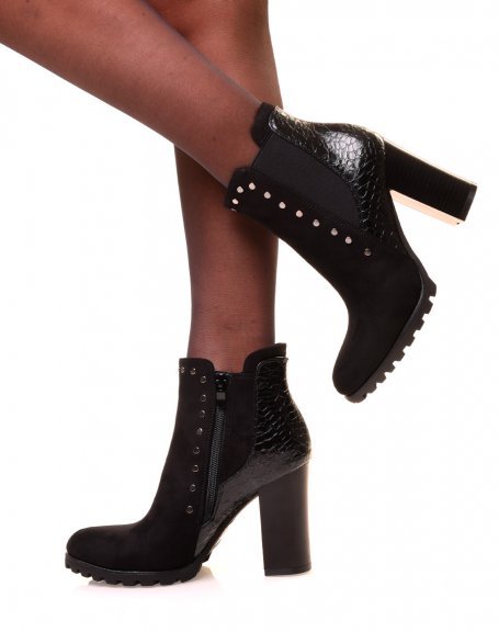 Black ankle boots with bi-material heels and studded details