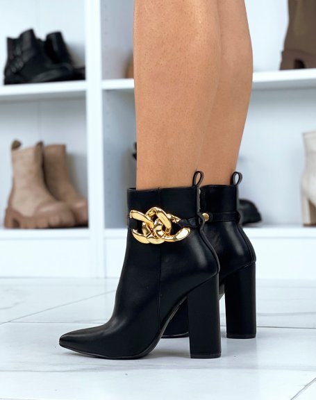 Black ankle boots with chunky heel and pointed toe with gold chain