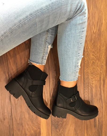 Black ankle boots with decorative details