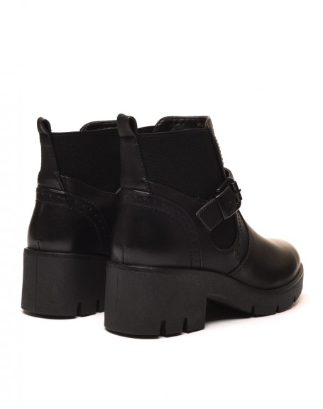 Black ankle boots with decorative details
