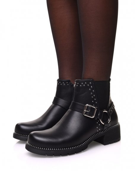 Black ankle boots with decorative strap with ring