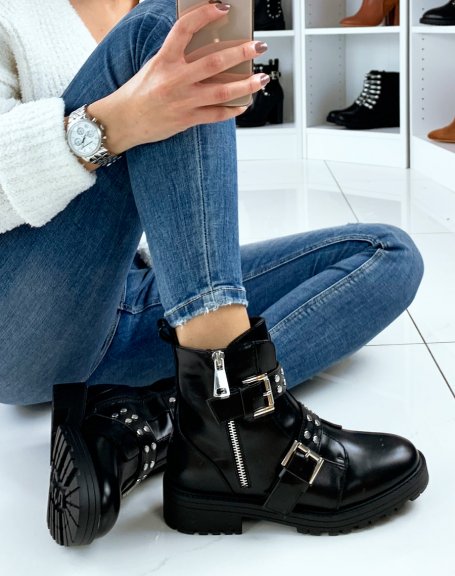 Black ankle boots with double straps and closure
