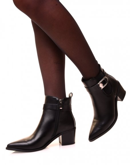 Black ankle boots with heels and pointed toe with a buckle