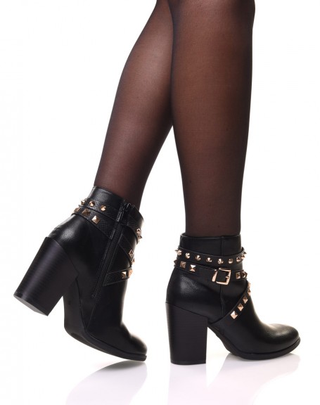 Black ankle boots with heels and pyramidal studs