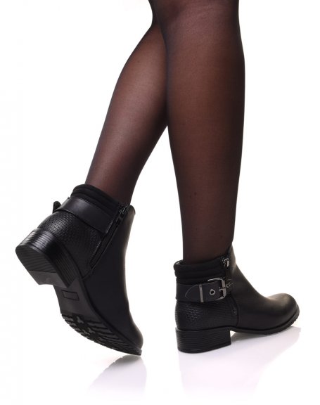 Black ankle boots with heels and zippers