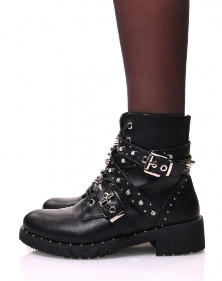 Black ankle boots with laces and multiple decorated straps