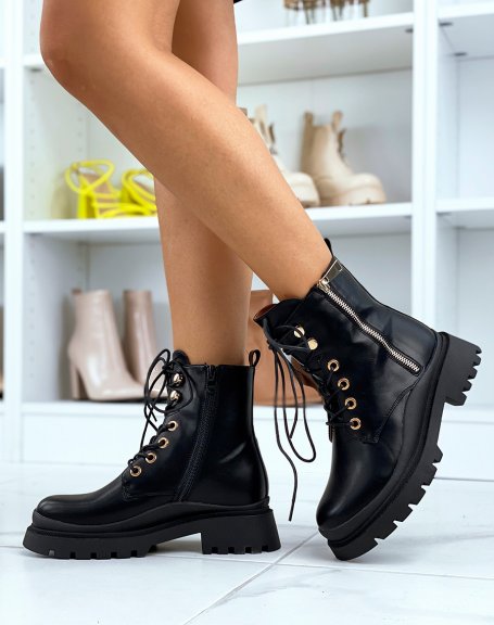 Black ankle boots with lug sole with gold detail