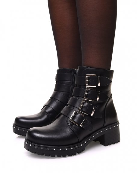 Black ankle boots with multiple straps and studded sole