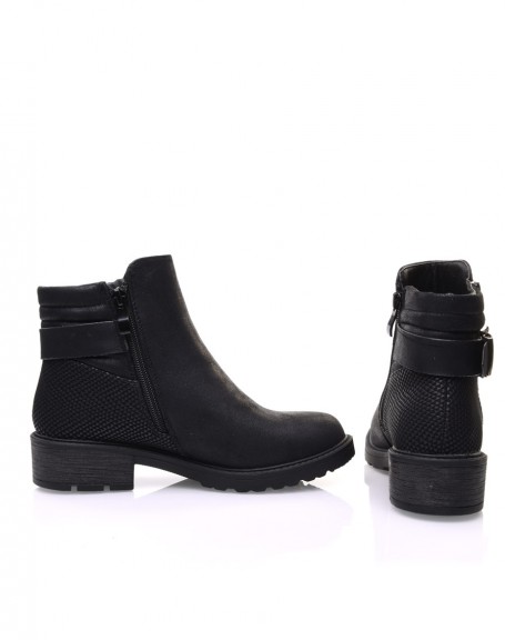 Black ankle boots with notched croc-effect soles