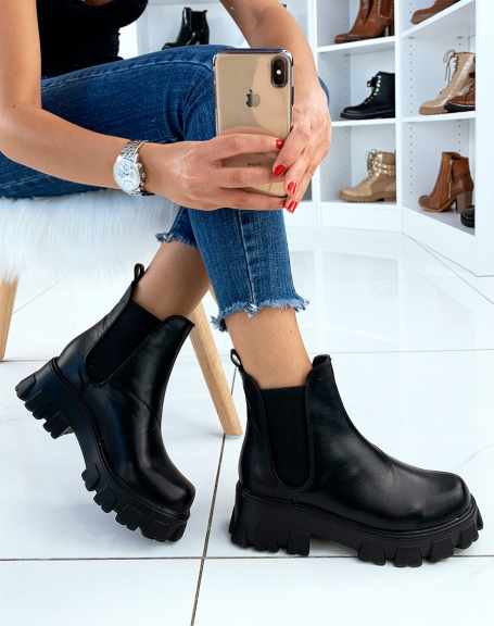 Black ankle boots with notched platform