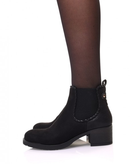 Black ankle boots with shiny scale print