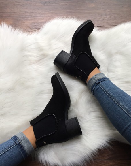 Black ankle boots with shiny scale print