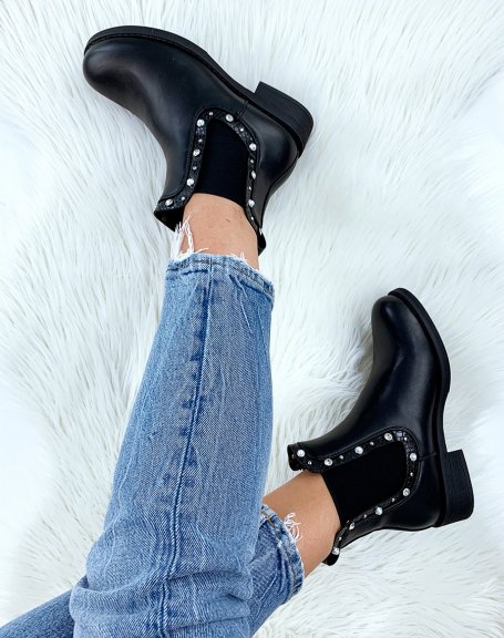 Black ankle boots with snake details and jewels around the elastic