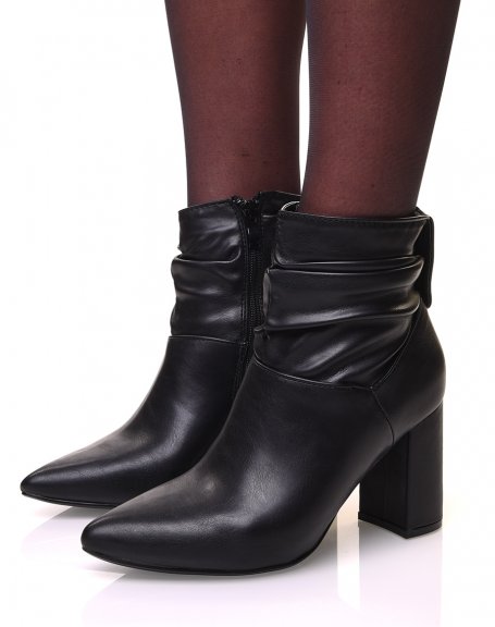 Black ankle boots with square heels and pleated effect pointed toes