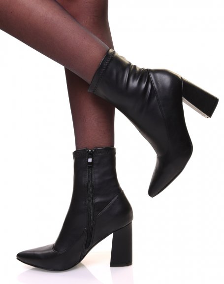 Black ankle boots with square heels and pointy sock-effect toes