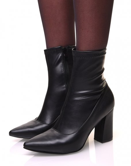 Black ankle boots with square heels and pointy sock-effect toes