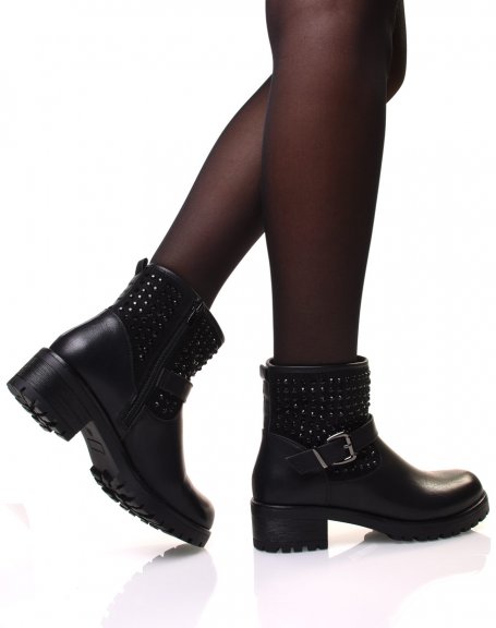 Black ankle boots with straps adorned with small studs
